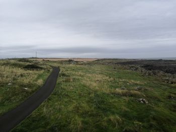 Scenic view of land against sky