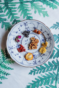 High angle view of cookies in plate on table