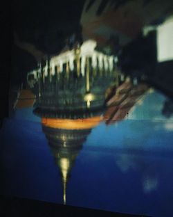 Close-up of beer at night