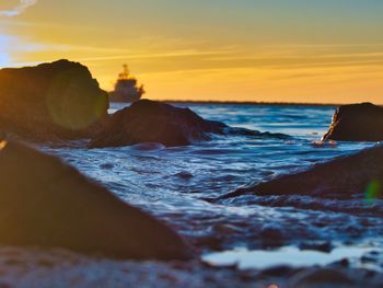 Scenic view of sea against sky during sunset