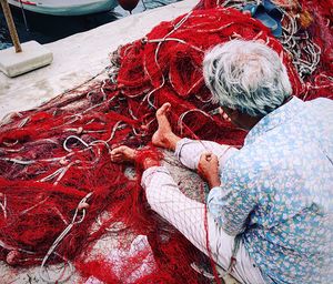 Rear view of a woman with fishing net