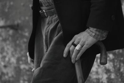 Close-up of couple holding hands