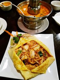 High angle view of meal served on table