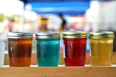 Artisanal jelly in glass jars farmer's market  flavors blue cream soda, blackberry , amaretto ,
