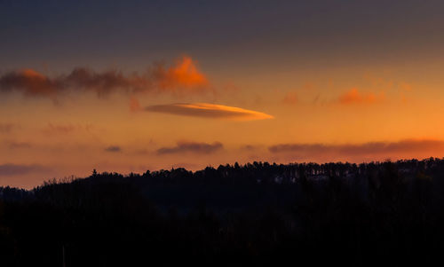 Scenic view of dramatic sky during sunset