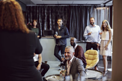 Group of people sitting in a room