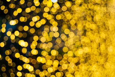 Defocused image of illuminated christmas lights