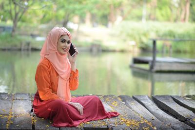 Woman sitting outdoors