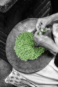 High angle view of hand holding food
