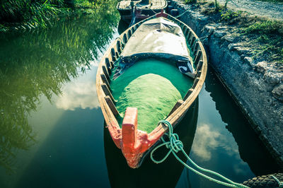 High angle view of boat moored on river