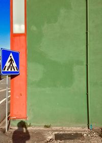Information sign on wall of building