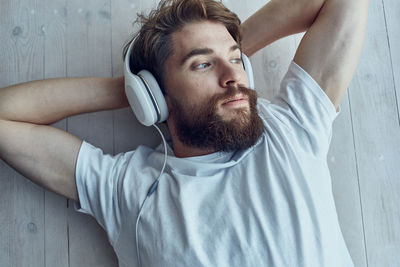 Portrait of young man using mobile phone