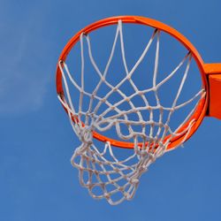 Low angle view of basketball hoop against sky
