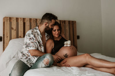 Young pregnant couple waiting for the baby. pregnancy session