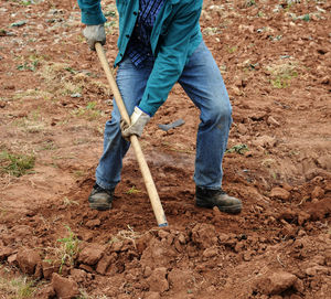 Low section of man working at construction site