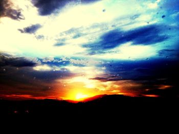 Scenic view of landscape at sunset