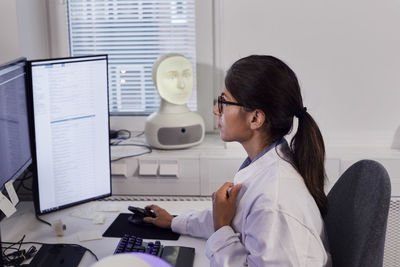 Female engineer working on computer
