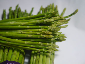 Close-up of vegetables on table against white background