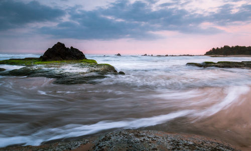 Scenic view of sea against sky during sunset