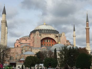 Low angle view of hagia sophia against cloudy sky