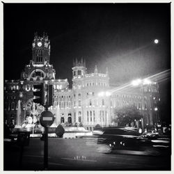 Buildings in city at night