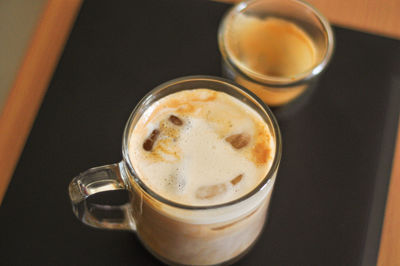 High angle view of coffee cup on table