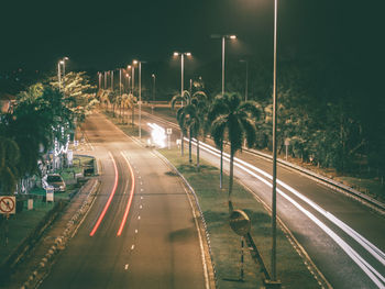 Cars on street at night