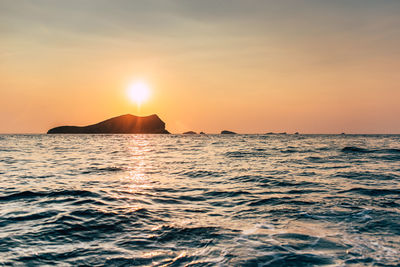 Scenic view of sea against sky during sunset