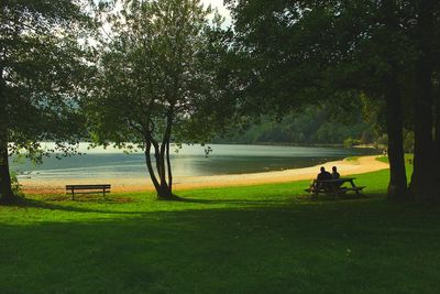 People sitting on golf course