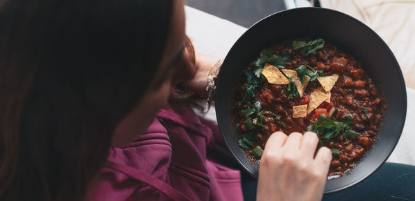 Woman eating mexican food