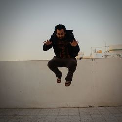 Full length of man jumping