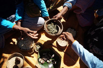 High angle view of people having food