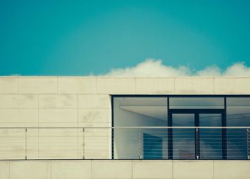 Low angle view of built structure against blue sky