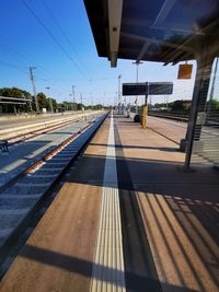 Railroad station platform against sky