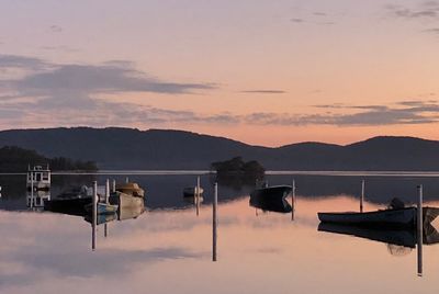 Scenic view of lake against sky during sunset