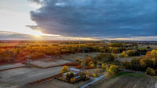 Scenic view of landscape against sky during sunset