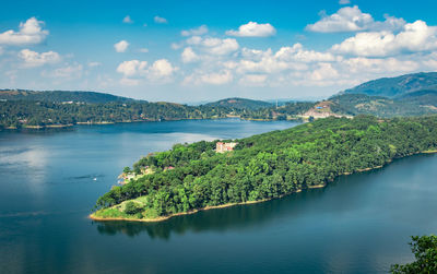 Serene lake with mountain background at day from top angle