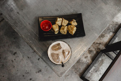 High angle view of fruits and vegetables on cutting board