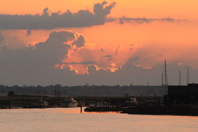 Scenic view of calm sea at sunset