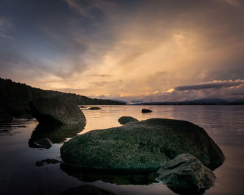 Scenic view of sea against sky during sunset