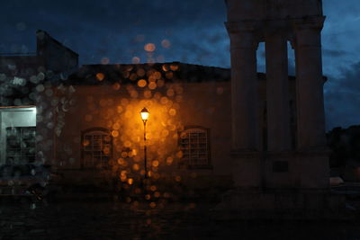 View of buildings against sky at night