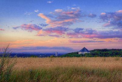 Scenic view of landscape at sunset