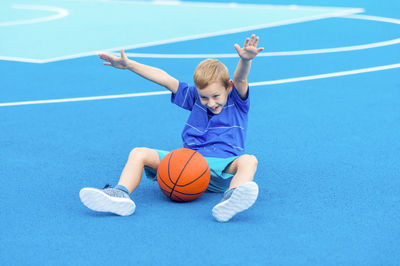 Boy playing with ball