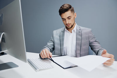 Businesswoman working at desk in office