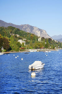 Scenic view of sea against clear blue sky