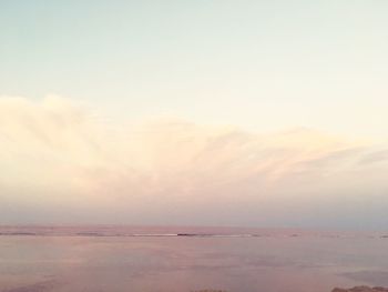 Scenic view of landscape against sky during sunset