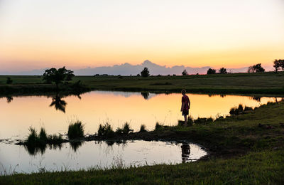 Scenic view of landscape at sunset