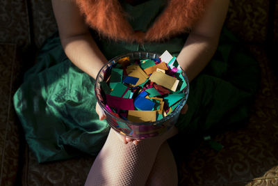 Midsection of woman holding ice cream