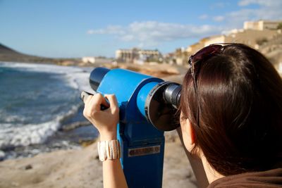 Close-up of woman standing on beach