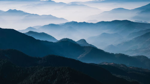 Scenic view of sillhouted mountains 